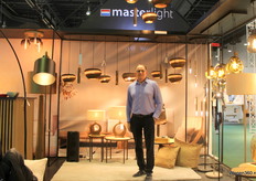 Owner William Joosten alongside the new collaboration with thinkpaper. They are cardboard shades and Masterlight makes the luminaires.